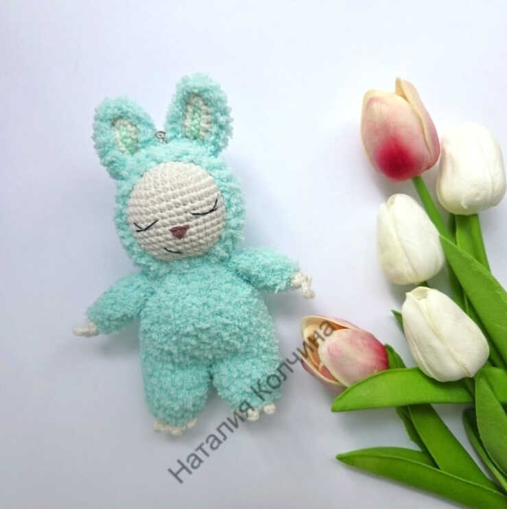 Handmade bunny amigurumi plush toy displayed with soft colors and gentle design, perfect for gift inspiration
