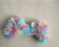 This image showcases the specific eyelid detail piece from the free amigurumi pattern. It is designed to fit precisely over the eyes to create an expressive character look. The full instructions for this technical detail are available in the provided link.