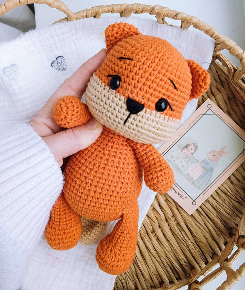This is a professional image of the little fox amigurumi from our free crochet pattern.