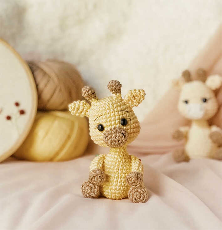 Free Sweet Giraffe Jemmy Amigurumi Pattern: A Low Sew and Quick to Make Amigurumi project for DIY nursery decor.