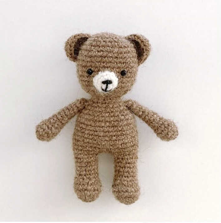 This is a high-quality image of the crochet bear plush toy showing the result of our free pattern instructions.