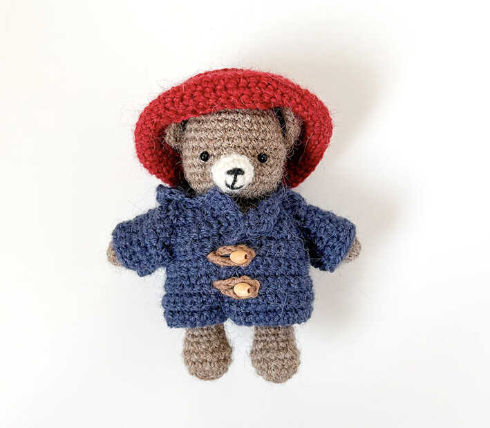This is a professional image of the little bear amigurumi outfit set from our free crochet pattern.