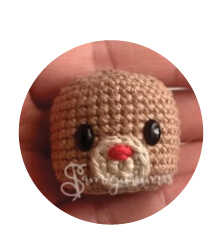 A detailed visualization focusing on the reindeer snout design, serving as an artistic preview of our free crochet pattern. This image captures the muzzle shaping to provide a stylistic reference for your handmade project. We share this concept to help you visualize the finished amigurumi reindeer face character.