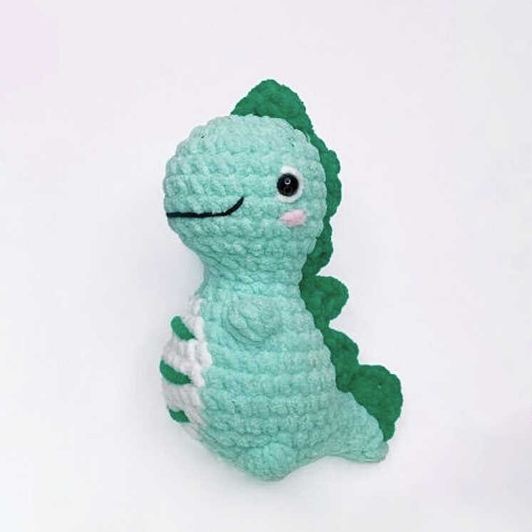 Single no sew dinosaur amigurumi with clean stitches, soft plush yarn and simple handmade design