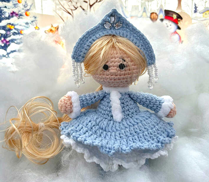 A detailed visualization of the Snow Maiden amigurumi doll, which is part of our comprehensive free pattern guide. This image serves as a clear preview of the character you can create using our provided instructions. We share this stylistic reference to help you visualize the finished project of this specific crochet pattern.